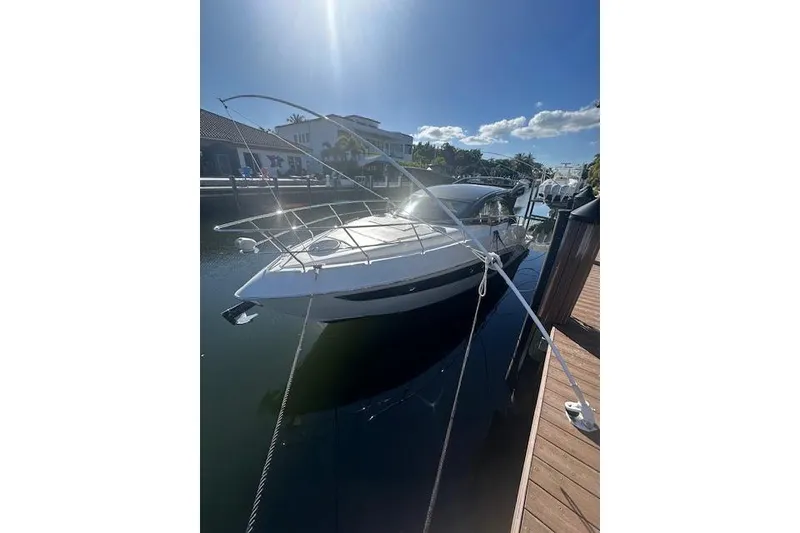 Slide: The Image of 2023 Schaefer 400 yacht docked in sunny marina setting. - 52