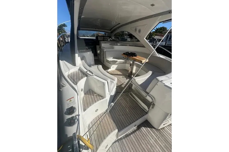 Slide: The Image of 2023 Schaefer 400 yacht interior with seating and table, showcasing modern design. - 60