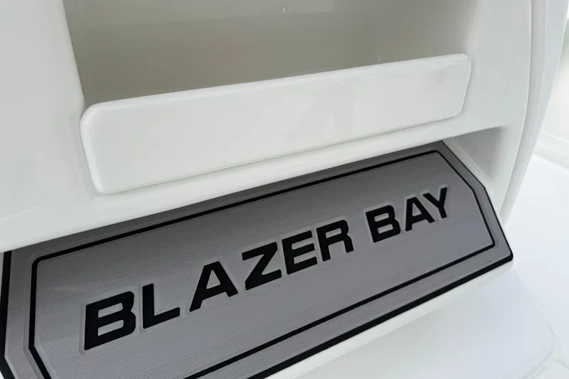 Slide: The Image of 2026 Blazer PureBay 2200 boat nameplate, featuring bold "Blazer Bay" text. - 23