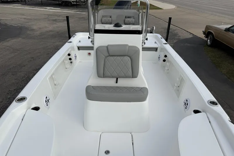 Slide: The Image of 2026 Blazer PureBay 2200 boat interior with gray seating and white deck. - 39