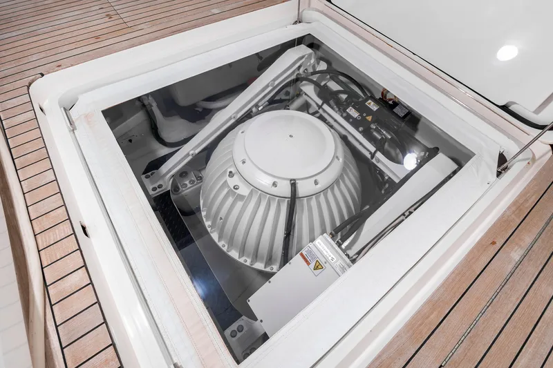 Slide: The Image of Engine compartment of 2024 Viking 72 Convertible yacht, showcasing advanced machinery and sleek design. - 116