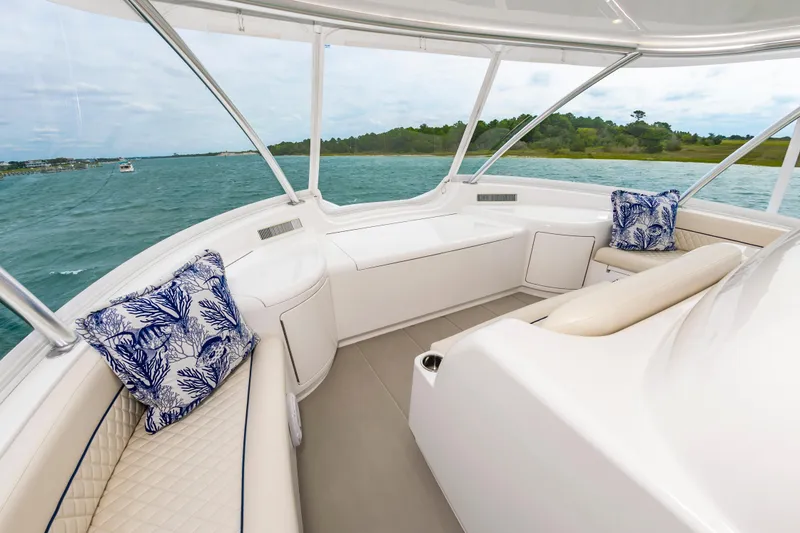 Slide: The Image of Luxurious seating area on 2024 Viking 72 Convertible yacht with ocean view. - 33