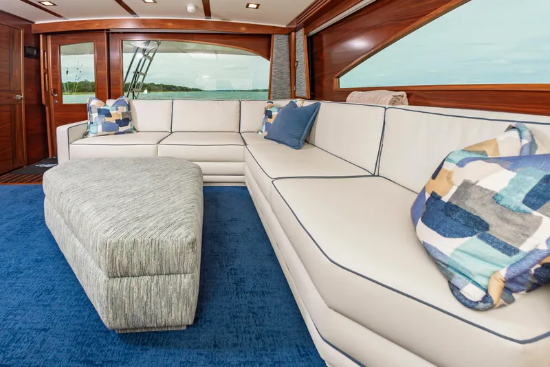 Slide: The Image of Luxurious interior of 2024 Viking 72 Convertible yacht with plush seating and stylish decor. - 47