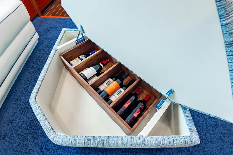 Slide: The Image of Luxurious wine storage in 2024 Viking 72 Convertible yacht interior. - 48