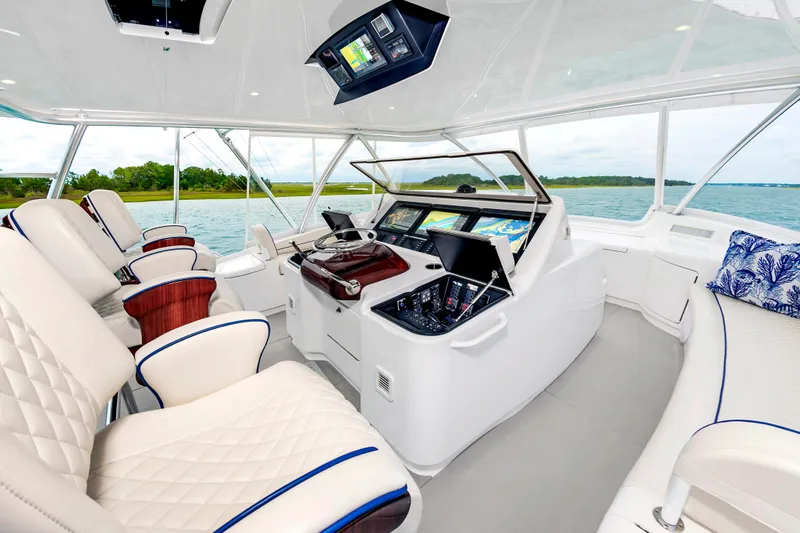 Slide: The Image of Luxurious interior of 2024 Viking 72 Convertible yacht with advanced navigation systems. - 7