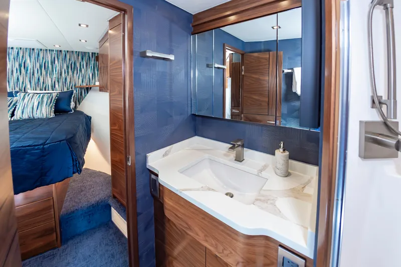 Slide: The Image of Luxurious bathroom and bedroom interior of 2024 Viking 72 Convertible yacht. - 88