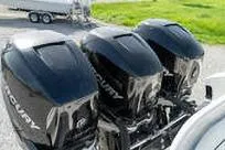 Slide: The Image of Triple Mercury outboard engines on a 2007 Fountain 38 CC Tournament Edition boat. - 11