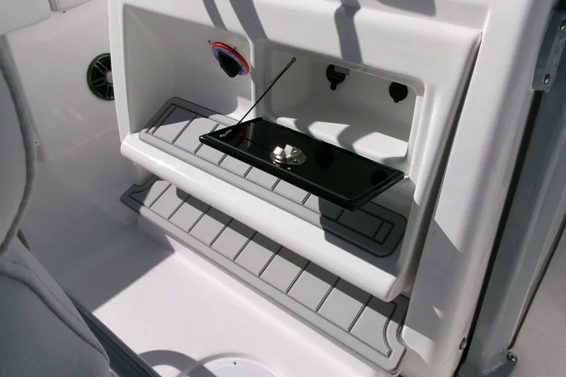 Slide: The Image of 2026 Sea Fox 248 Commander boat storage compartment with sleek design and modern features. - 18