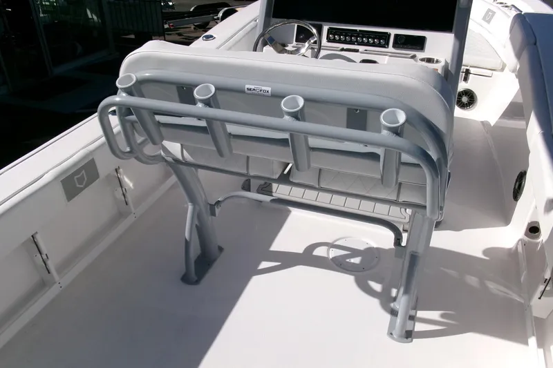 Slide: The Image of 2026 Sea Fox 248 Commander boat interior with seating and rod holders. - 24