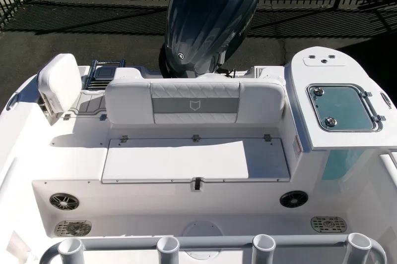 Slide: The Image of 2026 Sea Fox 248 Commander boat interior with seating and storage compartments. - 29