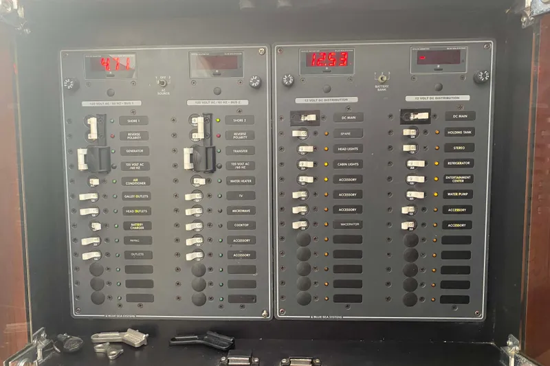 Slide: The Image of Electrical control panel of a 2007 Fountain 38 Sportfish Cruiser OB boat. - 22