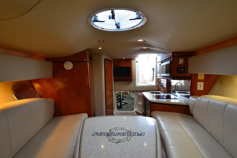 Slide: The Image of Luxurious interior of 2007 Fountain 38 Sportfish Cruiser OB with modern amenities and seating. - 28