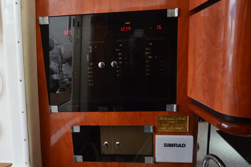 Slide: The Image of Control panel of 2007 Fountain 38 Sportfish Cruiser OB with Simrad equipment. - 37