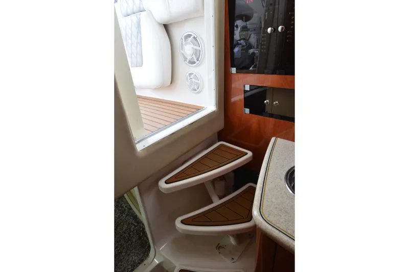 Slide: The Image of Interior view of 2007 Fountain 38 Sportfish Cruiser OB, featuring steps and seating area. - 41
