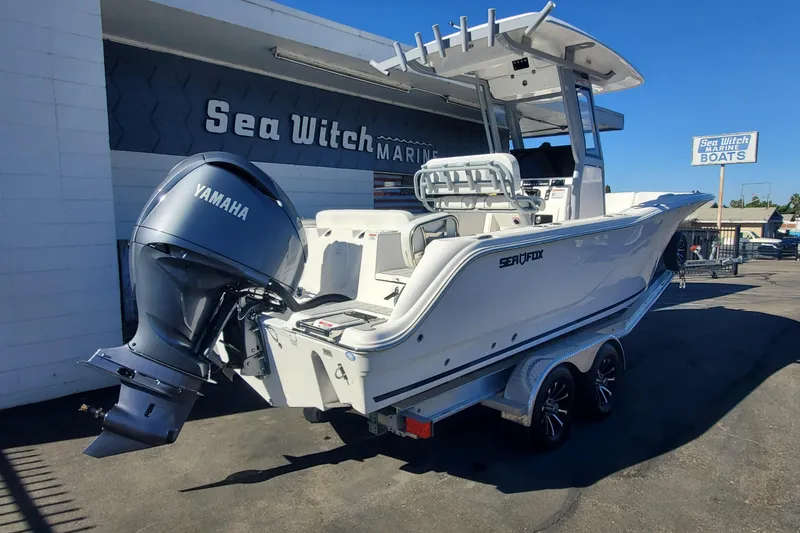 Slide: The Image of 2026 Sea Fox 248 Commander boat with Yamaha engine at Sea Witch Marine. - 2
