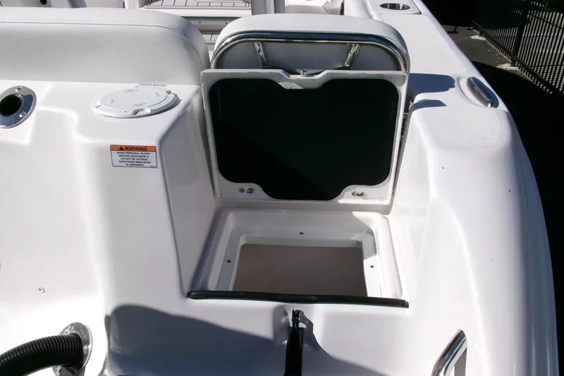 Slide: The Image of Open storage compartment on a 2026 Sea Fox 248 Commander boat. - 32