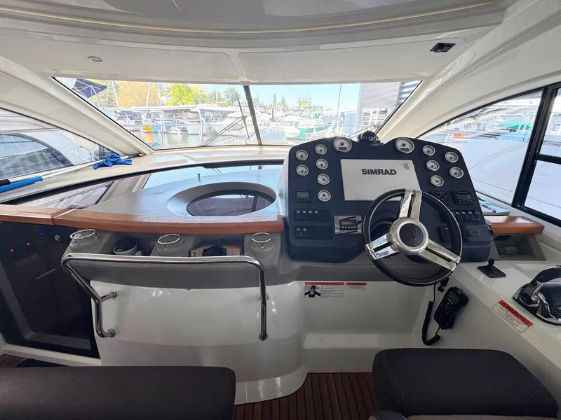 Slide: The Image of Helm of 2015 Beneteau Gran Turismo 44 yacht with Simrad navigation system. - 11