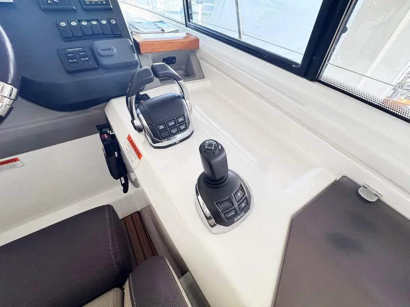 Slide: The Image of Control panel of 2015 Beneteau Gran Turismo 44 yacht with joystick and throttle. - 14