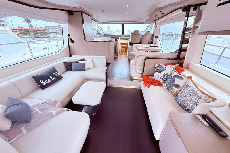 Slide: The Image of Luxurious interior of a 2020 Azimut 60 yacht with elegant seating and decor. - 10