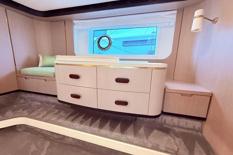 Slide: The Image of Luxurious interior of a 2020 Azimut 60 yacht with elegant cabinetry and seating. - 14