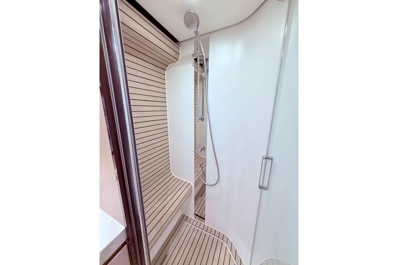 Slide: The Image of Luxurious shower area in 2020 Azimut 60 yacht with sleek design and modern fixtures. - 16