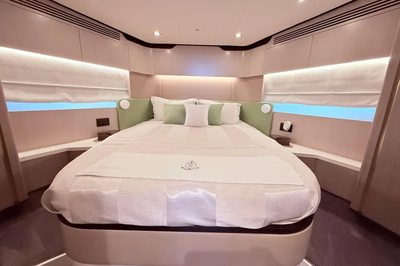 Slide: The Image of Luxurious bedroom interior of 2020 Azimut 60 yacht with modern design and ambient lighting. - 18