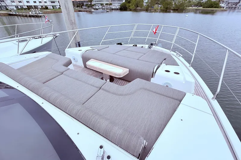 Slide: The Image of Luxurious 2020 Azimut 60 yacht with spacious sunbathing area on deck. - 24