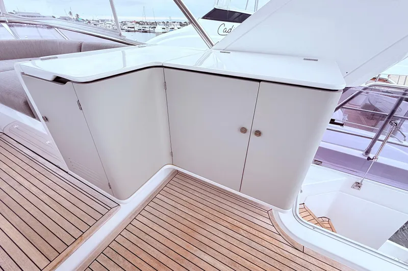 Slide: The Image of Luxurious Azimut 60 yacht interior with sleek cabinetry and teak flooring, 2020 model. - 29