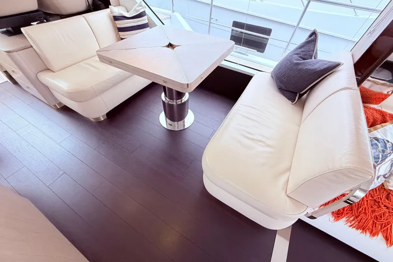 Slide: The Image of Luxurious interior of 2020 Azimut 60 yacht with elegant seating and modern table design. - 5