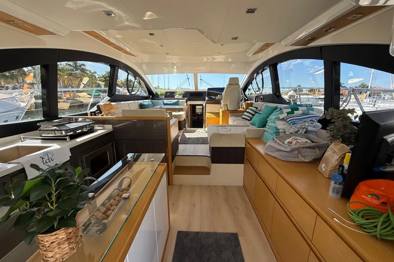 Slide: The Image of Luxurious interior of 2017 Schaefer 56 yacht with modern furnishings and panoramic windows. - 11