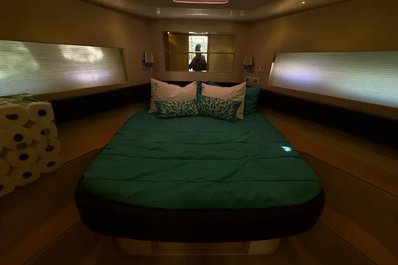 Slide: The Image of Luxurious bedroom interior of 2017 Schaefer 56 yacht with teal bedding and modern design. - 31