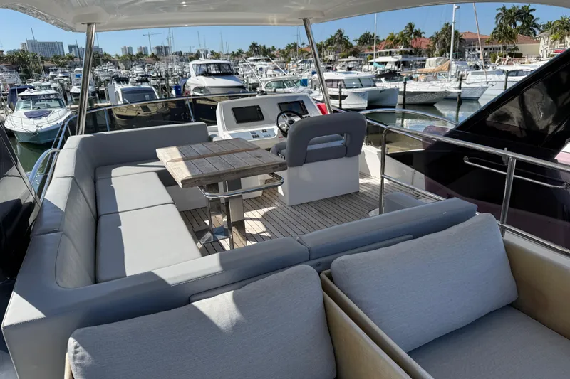 Slide: The Image of Luxurious 2017 Schaefer 56 yacht interior with seating and helm, docked at marina. - 35