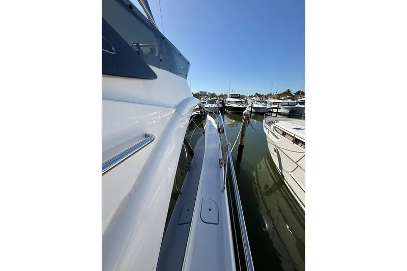 Slide: The Image of Schaefer 56 yacht docked in marina, 2017 model, sunny day, calm waters. - 41
