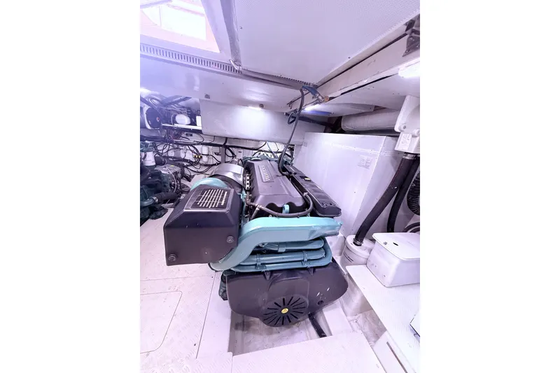 Slide: The Image of Engine room of 2017 Schaefer 56 yacht, showcasing a well-maintained engine setup. - 49