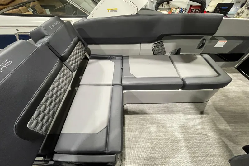 Slide: The Image of 2026 Harris Crowne 250 boat interior with luxurious seating and modern design. - 17