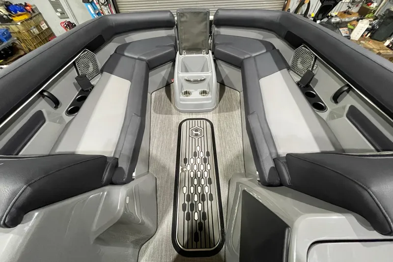 Slide: The Image of Luxurious interior of 2026 Harris Crowne 250 pontoon boat with plush seating and modern design. - 25