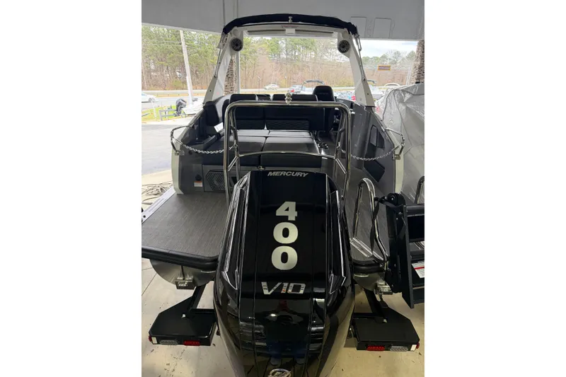 Slide: The Image of 2026 Harris Crowne 250 boat with Mercury 400 V10 engine, rear view. - 7