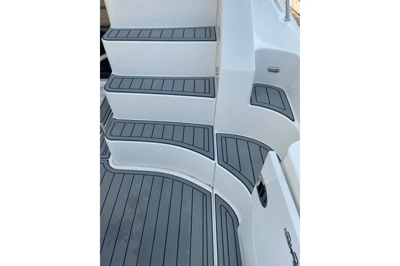 Slide: The Image of Staircase on 2008 Sea Ray 47 Sedan Bridge yacht with sleek, modern design. - 9