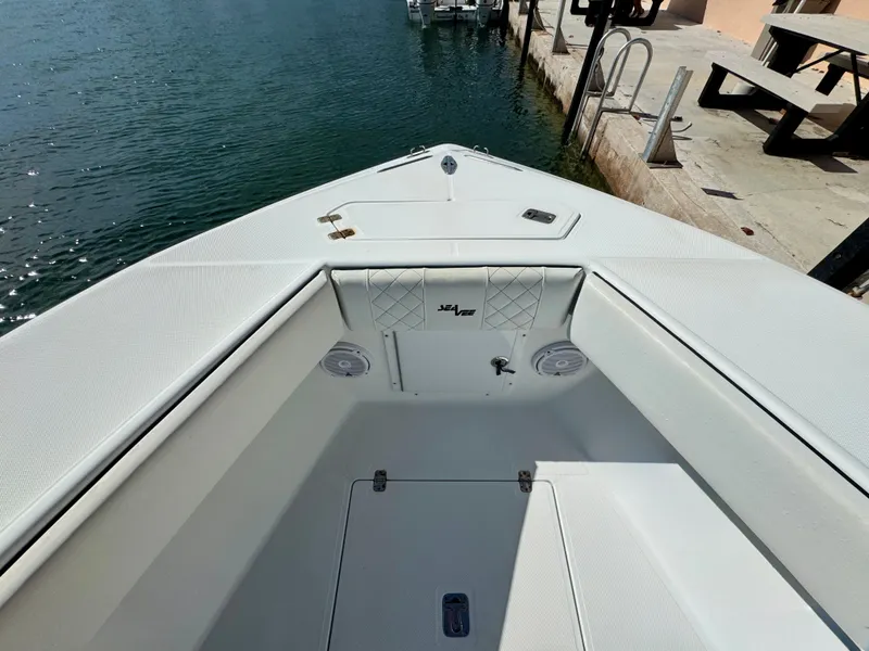 Slide: The Image of Interior view of a 2000 SeaVee 340i boat at the dock. - 17