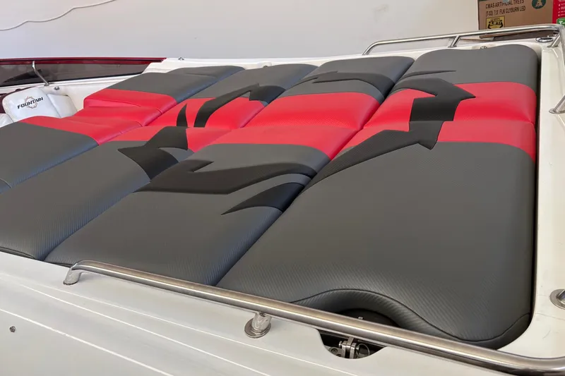 Slide: The Image of 2006 Fountain 42 Lightning boat with red and gray cushioned seating. - 16