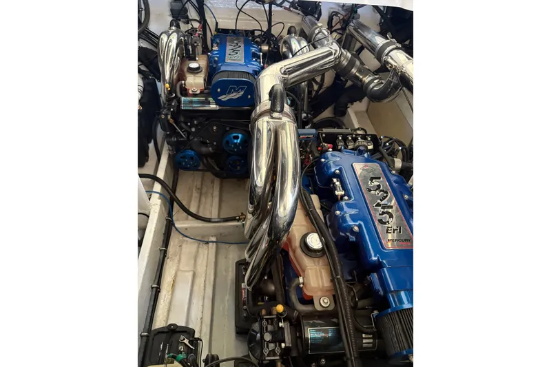 Slide: The Image of Twin Mercury EFI engines in a 2006 Fountain 42 Lightning boat. - 21