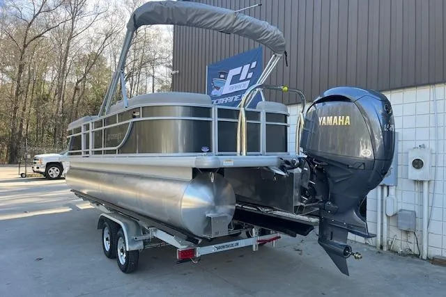 Slide: The Image of 2026 Godfrey EX 2286 SBX pontoon boat with Yamaha motor on trailer. - 4