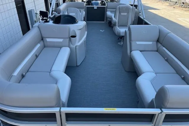 Slide: The Image of 2026 Godfrey EX 2286 SBX pontoon boat with spacious seating and modern design. - 6