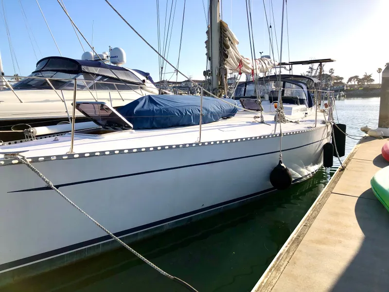 The Image of 1981 Cheoy Lee Golden Wave yacht docked at marina, side view. - 0