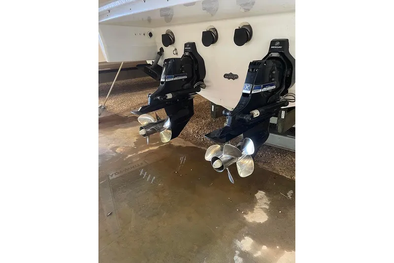 Slide: The Image of 2015 Formula 350 Sun Sport boat with dual Mercury outboard engines and propellers. - 11