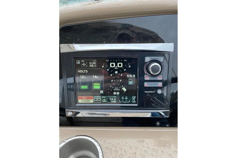 Slide: The Image of 2015 Formula 350 Sun Sport dashboard with digital display and controls. - 14