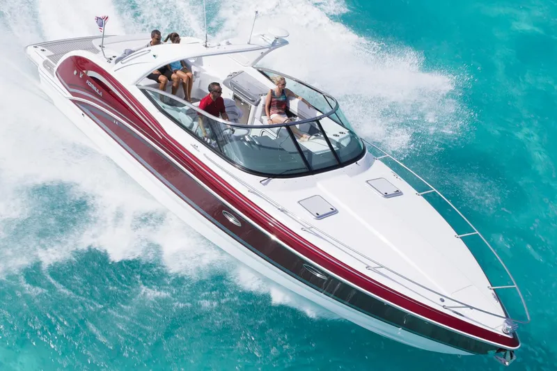 Slide: The Image of Manufacturer Provided Image: 2015 Formula 350 Sun Sport boat cruising on turquoise water. - 18