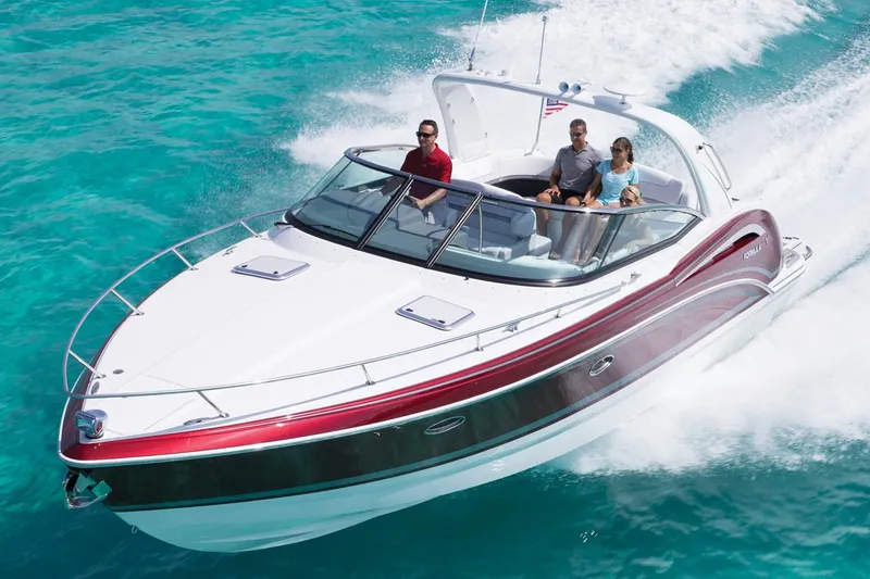 Slide: The Image of Manufacturer Provided Image: 2015 Formula 350 Sun Sport boat cruising on clear turquoise water. - 19