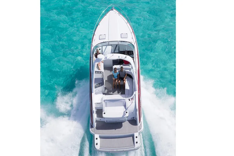 Slide: The Image of Manufacturer Provided Image: 2015 Formula 350 Sun Sport boat cruising on clear turquoise water. - 23