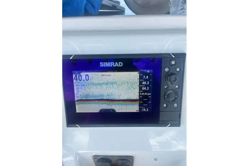 Slide: The Image of Simrad fishfinder display on 1997 Stamas 290 Tarpon boat dashboard. - 13